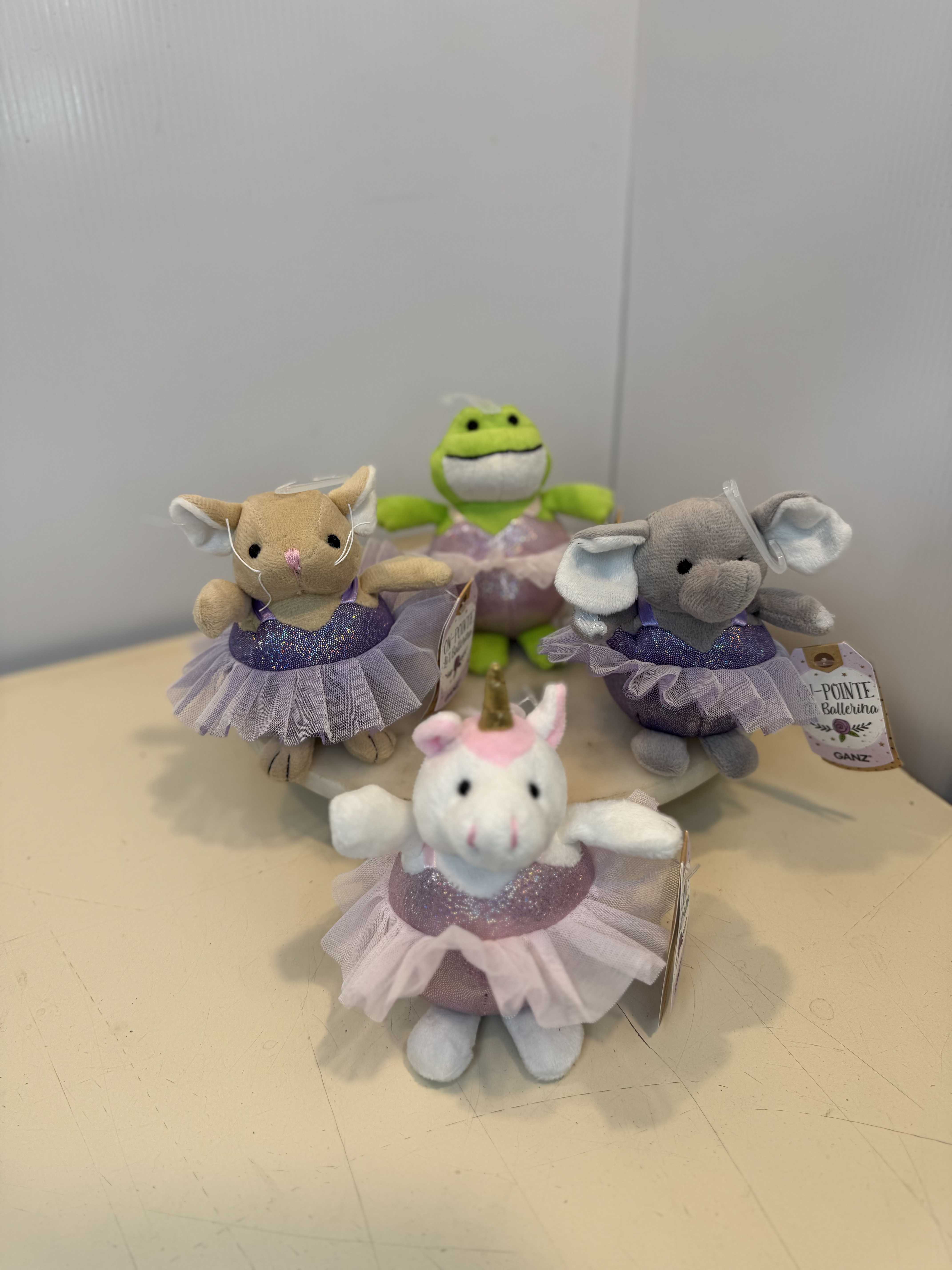 Mini Plush Ballerina Animals - Mini plush ballerina animals dressed in glittery tutus. Featuring adorable characters like a unicorn, elephant, frog, and mouse- perfect for dance recital gifts and sweet surprises. 