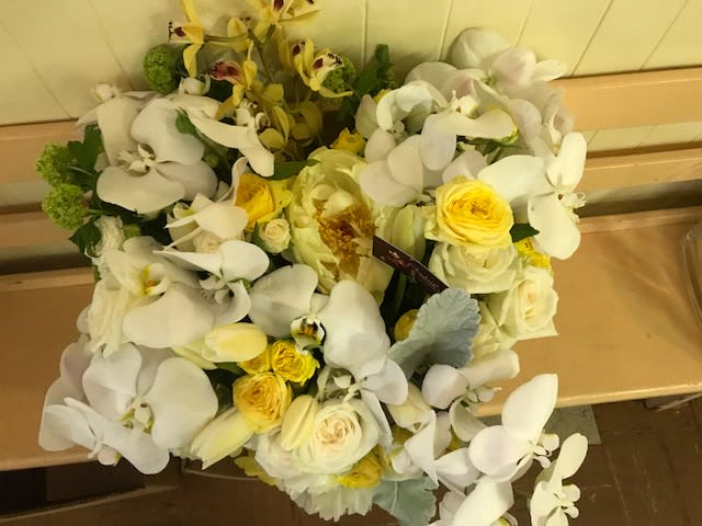 Bouquet of white orchids and yellow roses