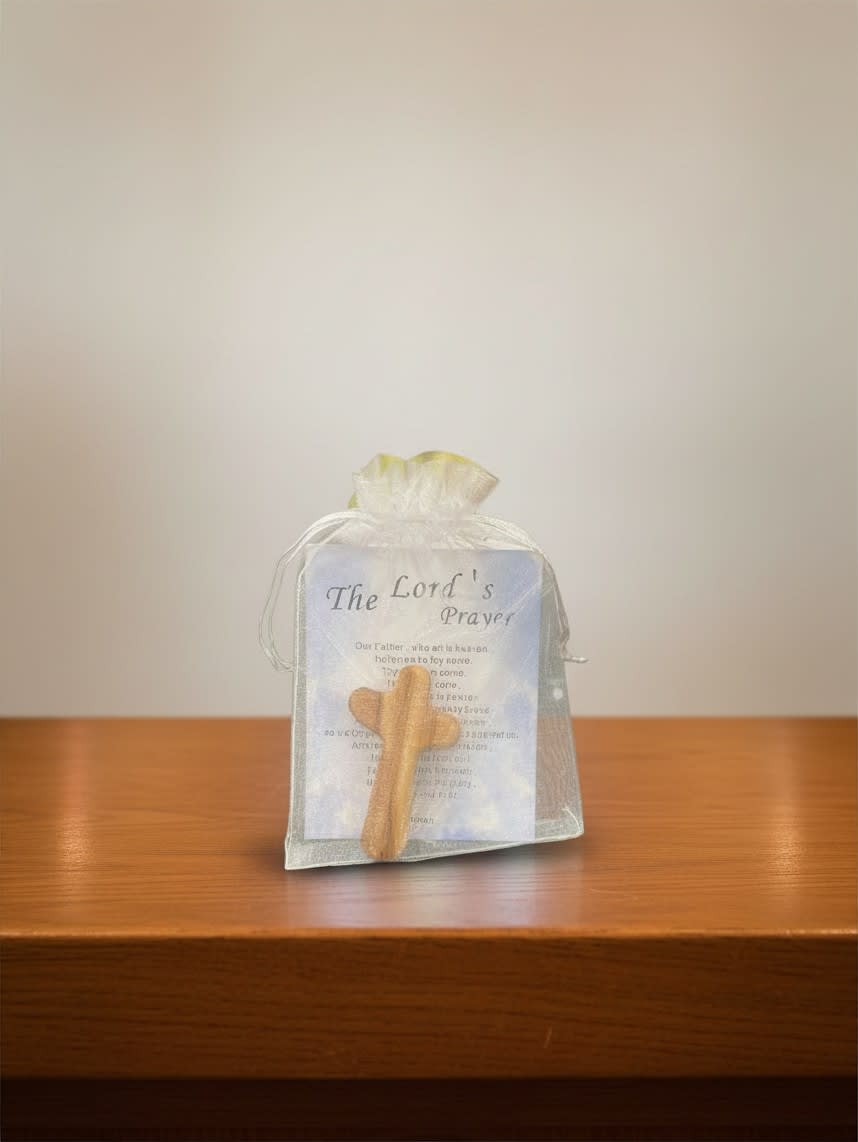 Small gift bag with a wooden cross and prayer card