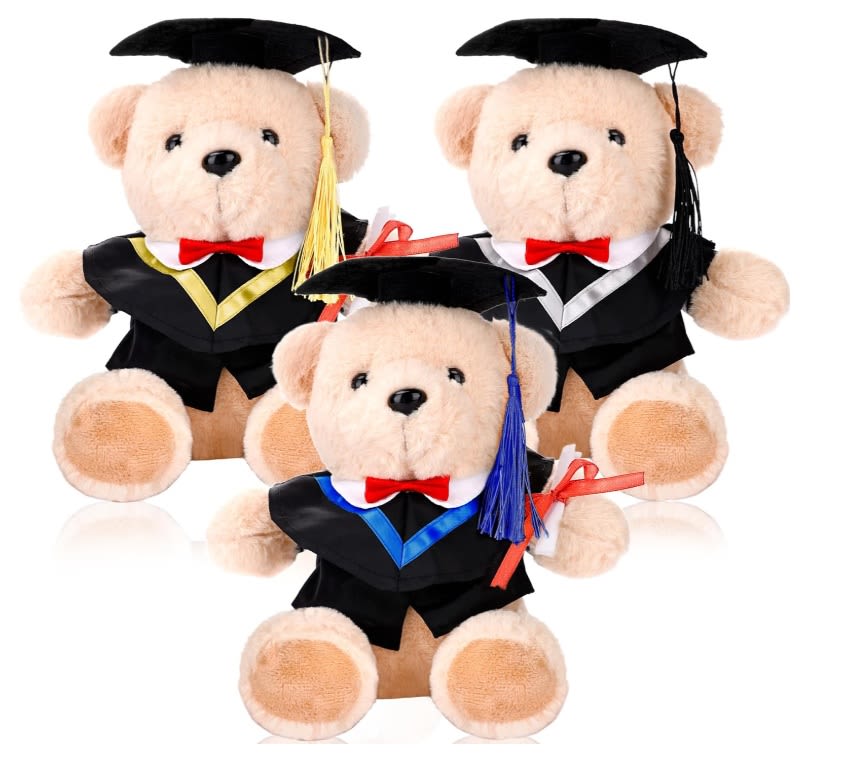 Graduation Plush  -  Graduation Teddy Bear   Celebrate your graduate with this adorable keepsake! Our plush graduation teddy bear is dressed in a classic cap and gown, complete with a tassel and a mini diploma for the perfect finishing touch.  Each bear is soft, cuddly, and makes a meaningful gift for graduations of all levels—whether it’s preschool, high school, or college.   Available in multiple trim colors to match your graduate’s style or school colors.   Important: Each purchase includes ONE (1) bear — photos may show multiple bears for display purposes only.   Price: $20.00 each  Perfect for gifting, celebrating, or adding to a graduation bundle!