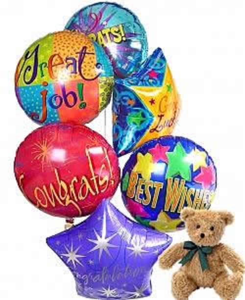 Colorful congratulatory balloons with a teddy bear