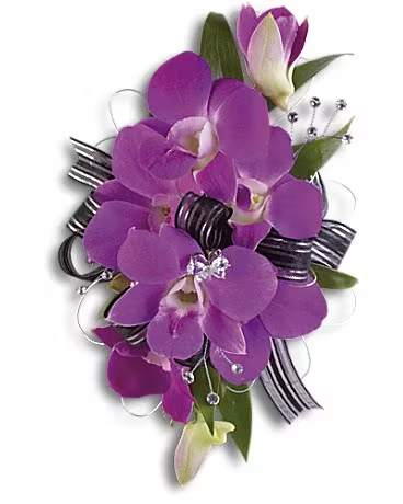Purple orchid corsage with ribbon and rhinestone accents
