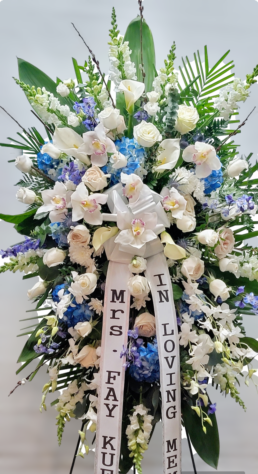 Heaven sent - Calla lily.  Cymbidium.  Delphinium. Roses. Snap 
