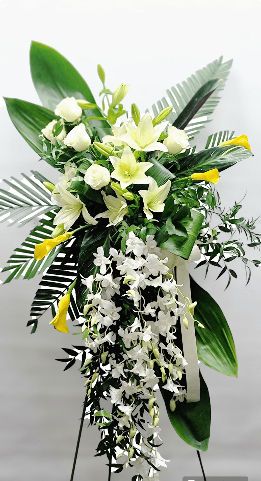 Morden spray - Yellow Calla lily.  Whit lily. Whit dendrobium 