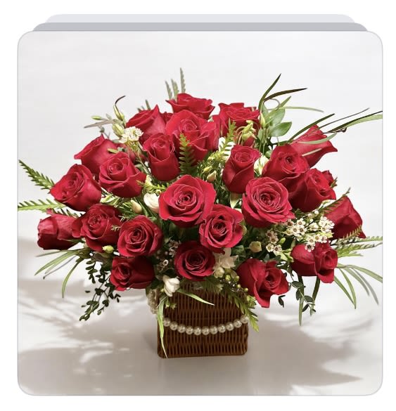 Red rose bouquet in a square basket with pearl trim