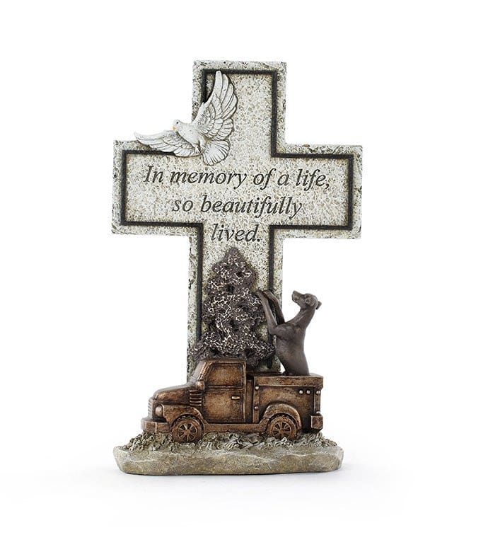 Memorial cross plaque with a dove and pickup truck figurine