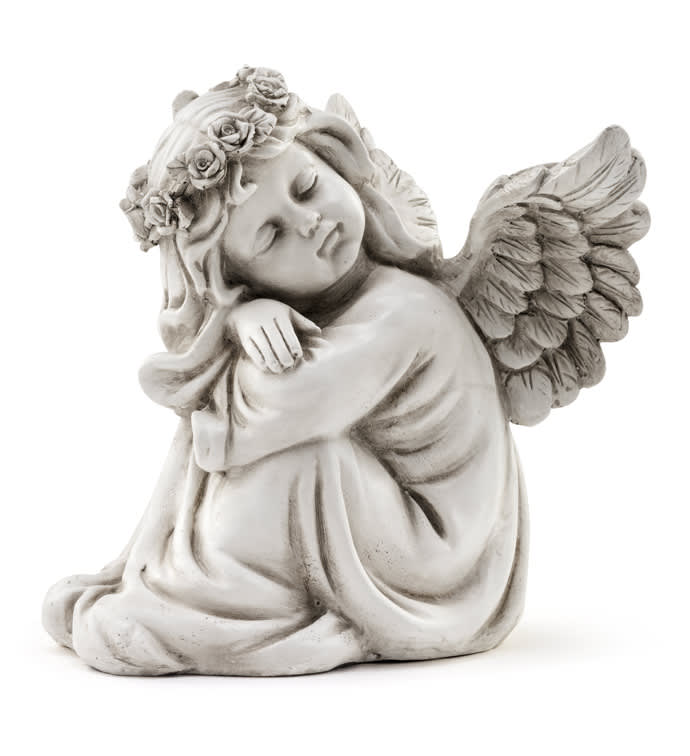 Stone angel figurine with flower crown and wings