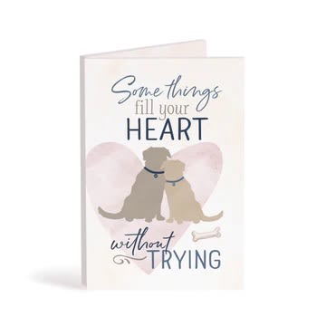 Greeting card with two dogs and the text "Something fill your HEART without TRYING"