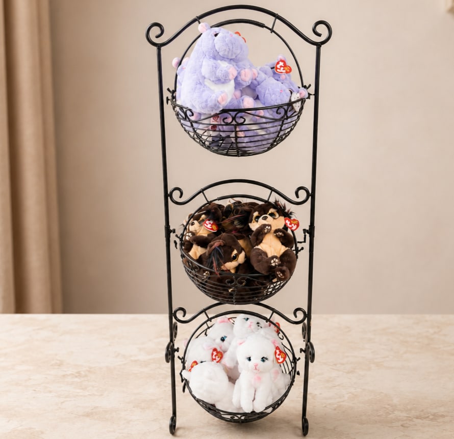 Three wire baskets filled with plush teddy bears on a metal stand