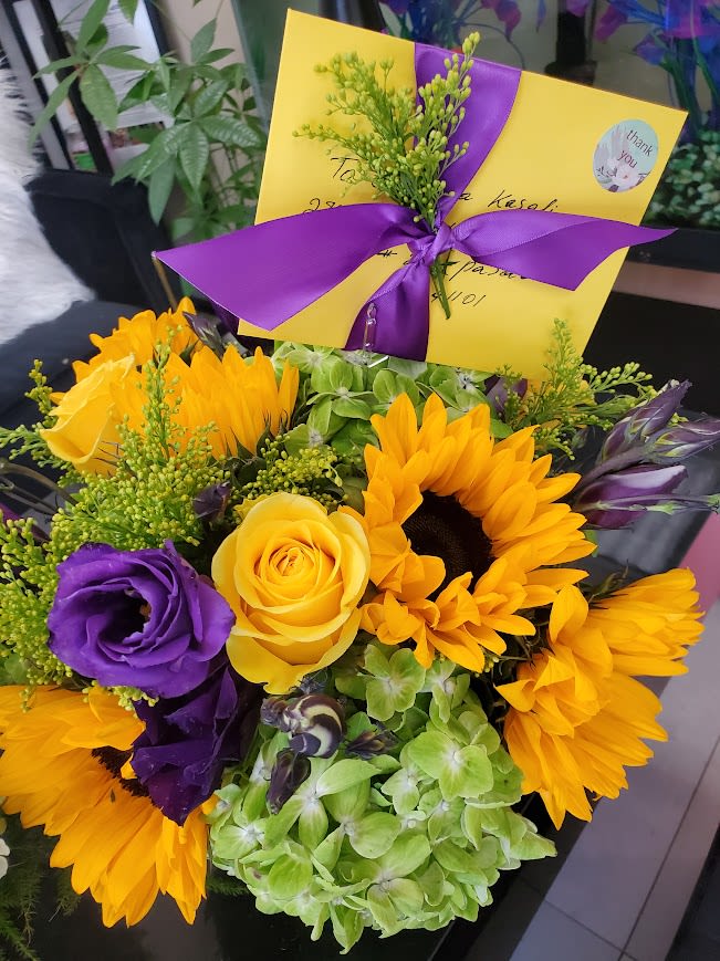 Love Bright - Bright mixed bouquet with sunflowers, yellow rose, purple lisianthus, green hydrangea.