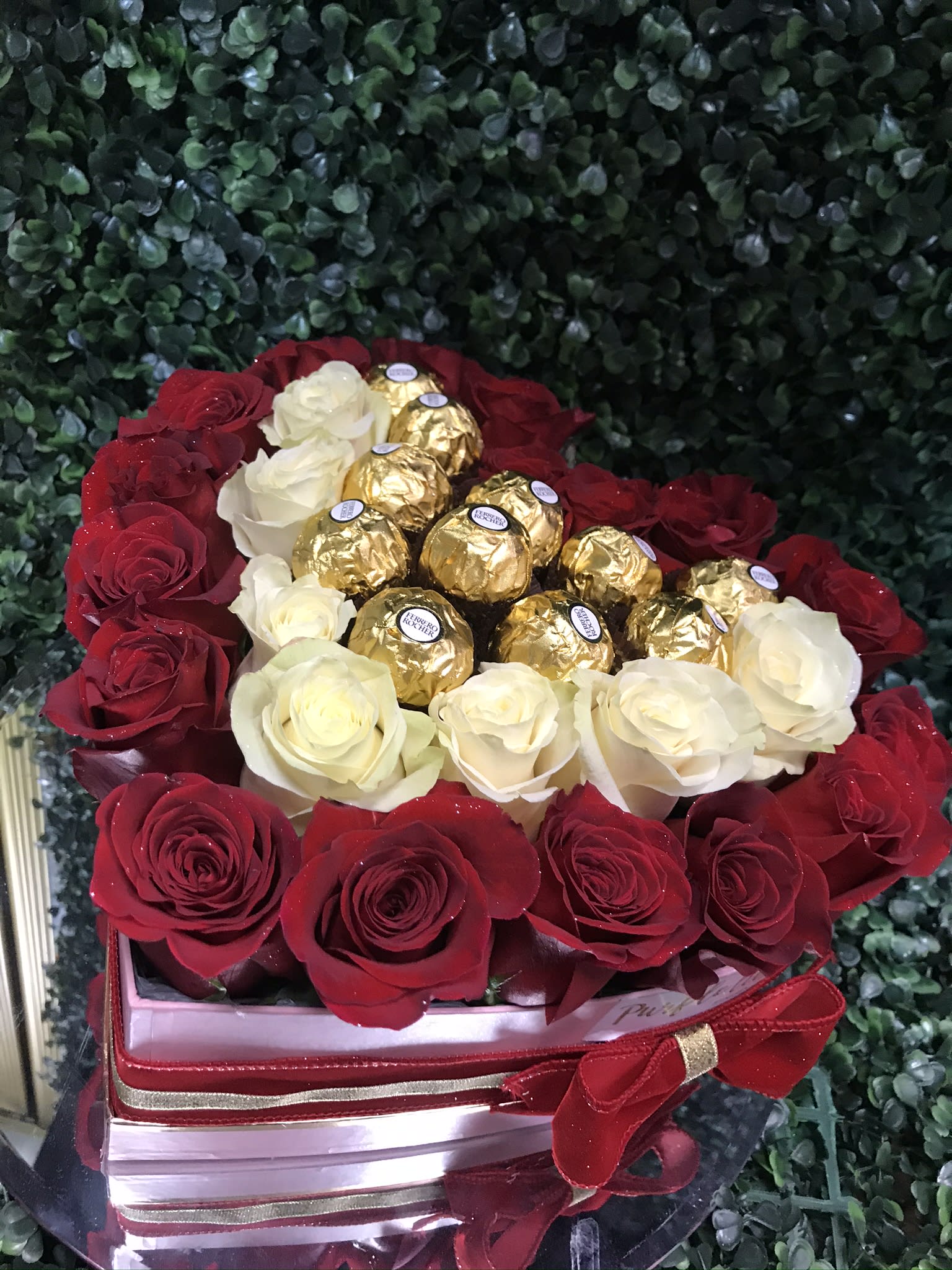 Heart-shaped rose arrangement with Ferrero Rocher chocolates
