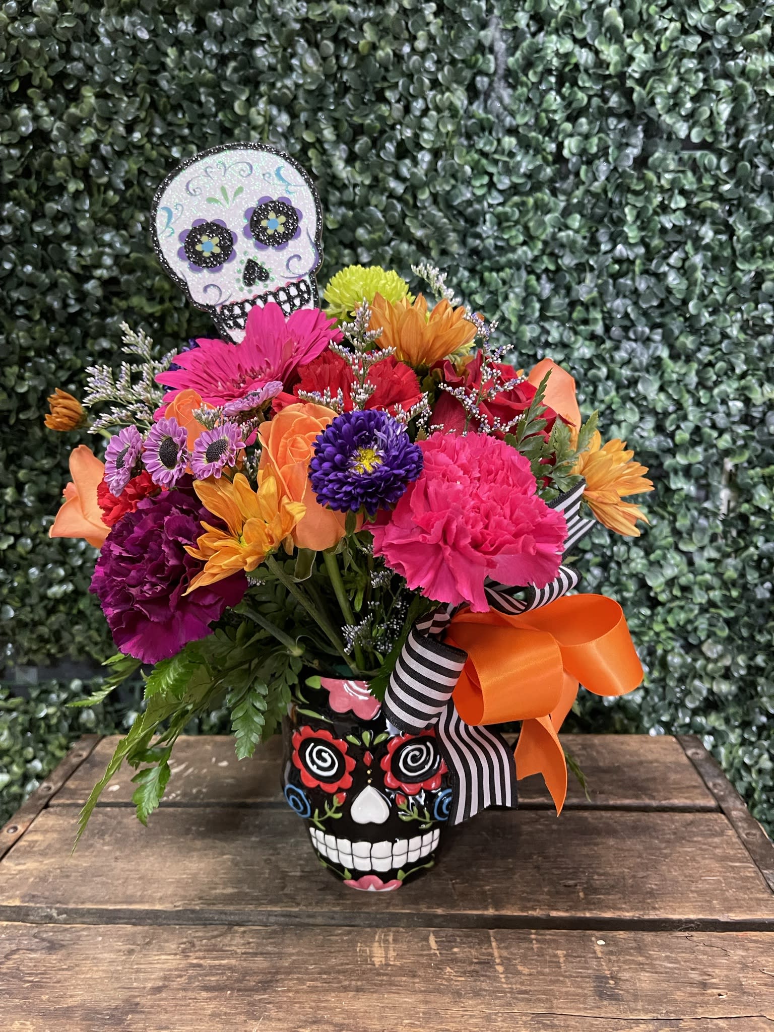 Dia de los Muertos Mug PLA75 - Celebrate this Halloween season with a fun coffee mug which contains an explosion of color with a combination of roses, carnations and daisies. Each mug is a one piece, meaning the colors will be presented differently in accordance to the cup's colors and design but keeping the same look. Please indicate if you would like us to look for that special mug in your beloved one favorite colors! 