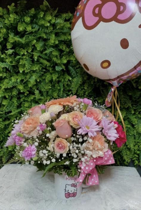 Mixed pink and peach bouquet with a Hello Kitty balloon