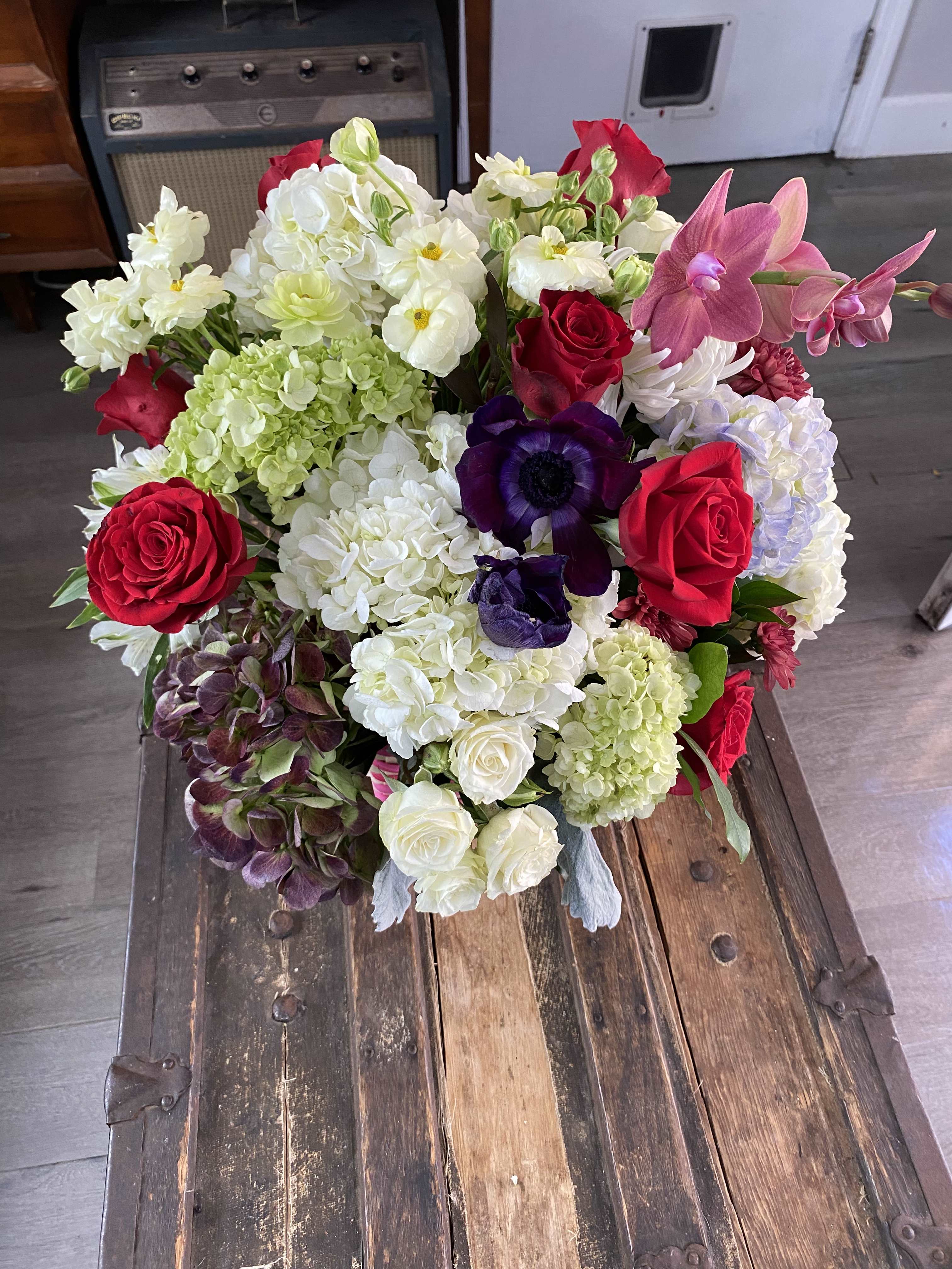 Mixed bouquet of red, white, pink, and purple flowers