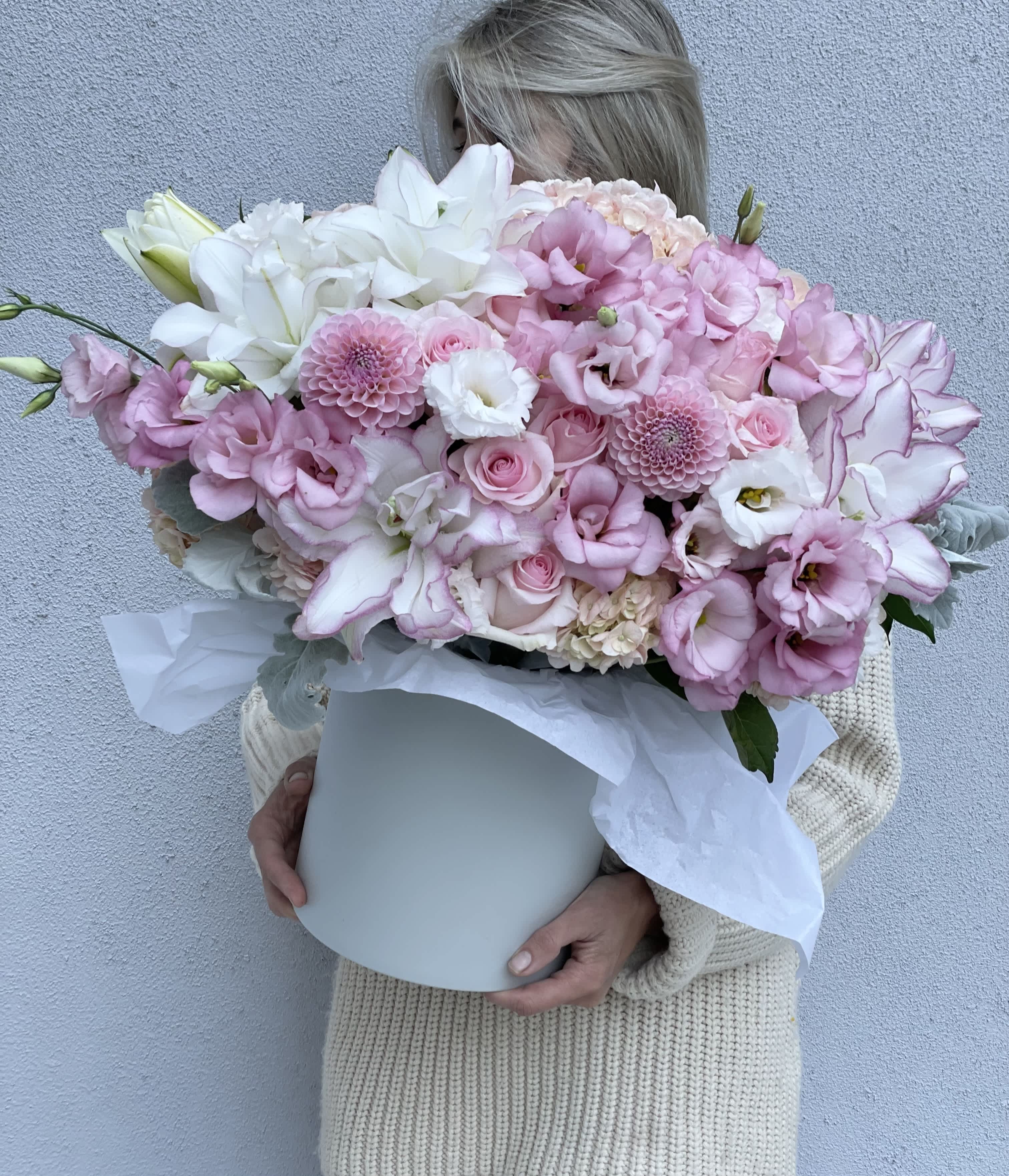 Large pink and white bouquet in a white hatbox