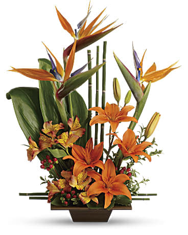 paradise  found - This  arrangement  make with bird of paradise , lilies, and Alstroemeria   and ti leaf