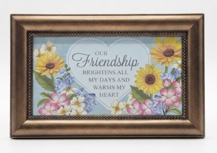 Framed friendship sign with painted flowers and a heart-shaped message