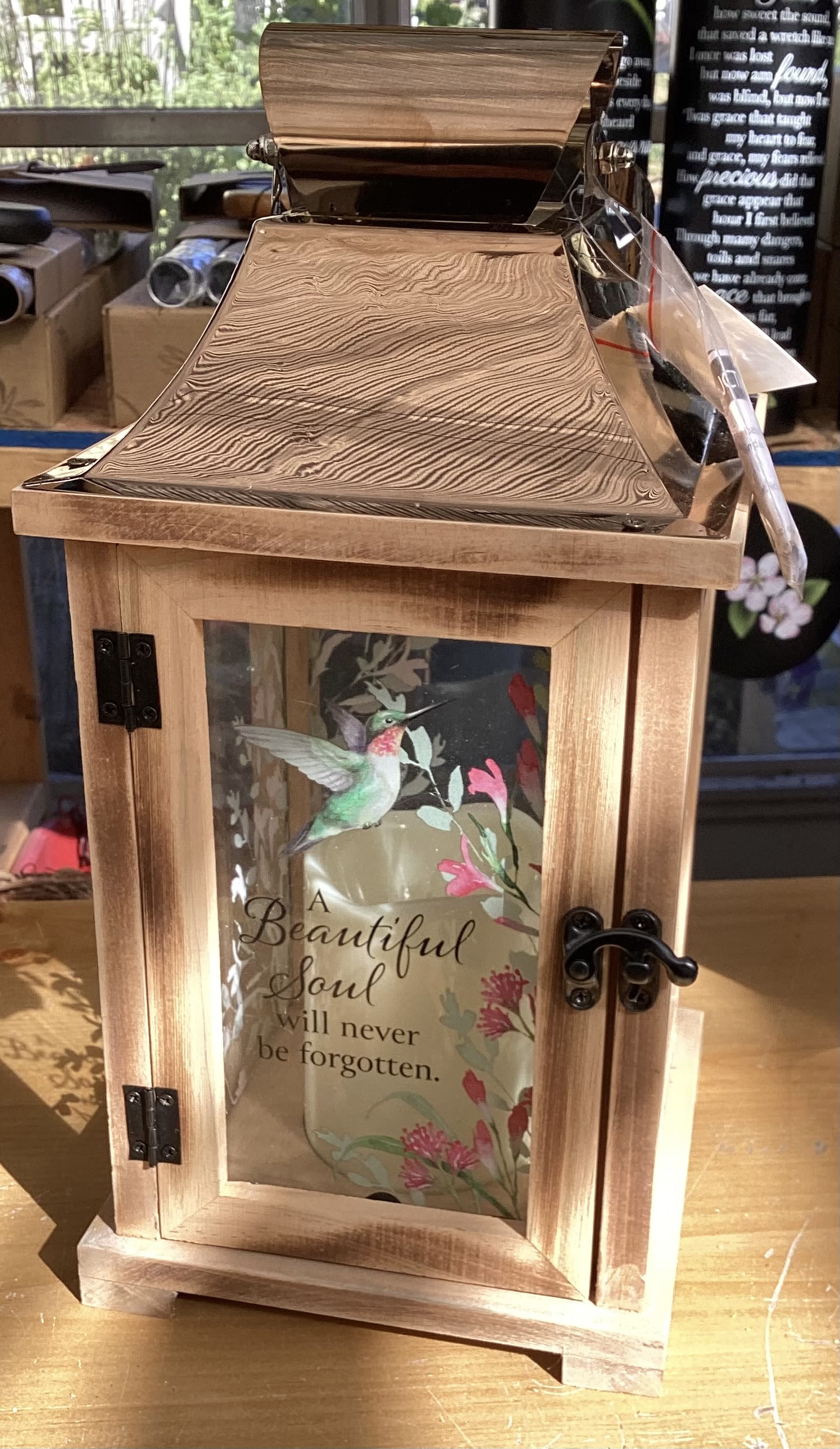 Wooden memorial lantern with a hummingbird and sympathy message