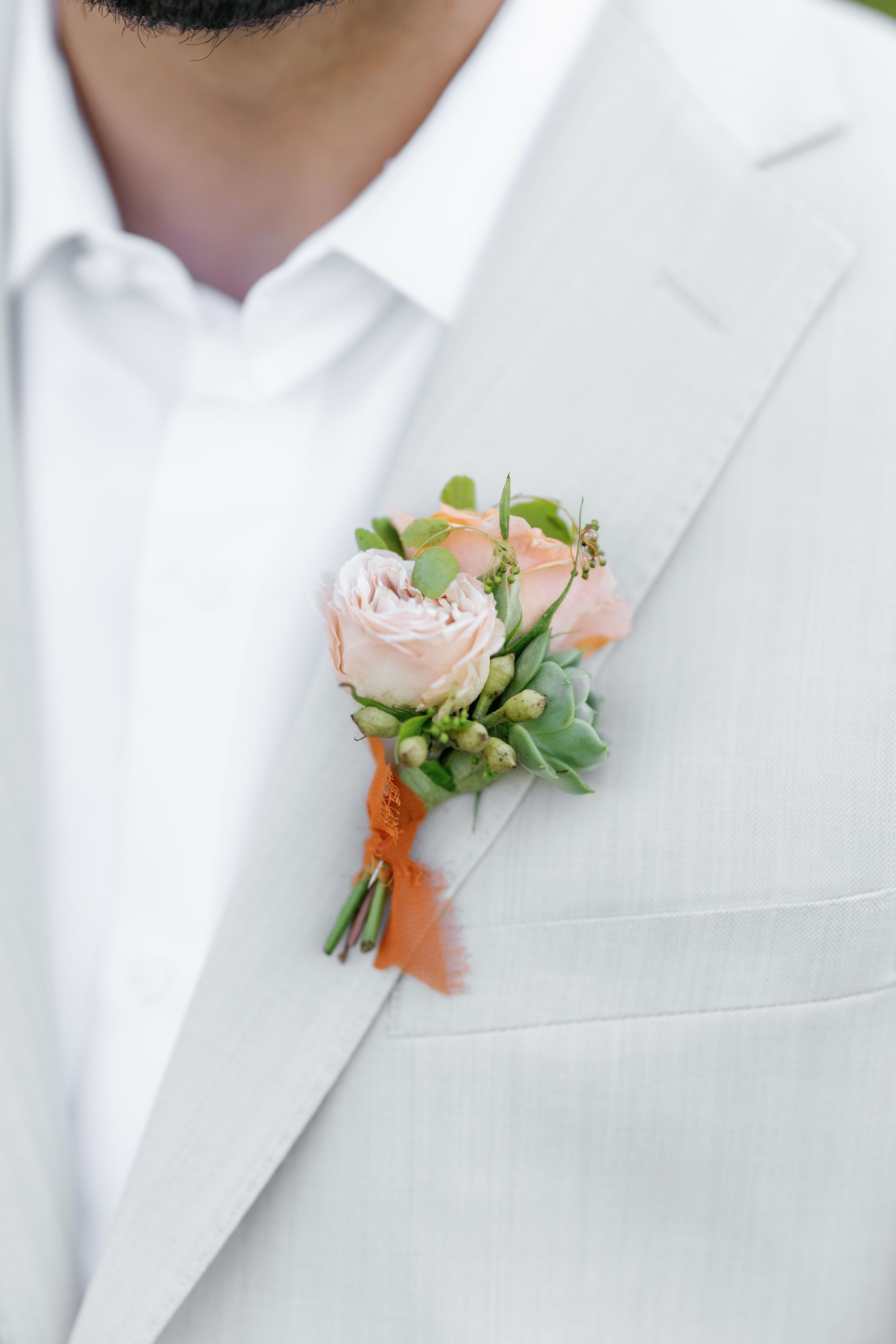 Prom &amp; Homecoming Boutonnieres: Soft + Elegant - Complete your prom or homecoming look with our stunning collection of boutonneires. Available in a variety of styles, from classic to modern, each boutonniere is crafted with fresh, vibrant flowers, ensuring your accessory lasts all night long. Whether you're looking for something simple and elegant or a bold, statement-making design, our boutonnieres are the perfect finishing touch for your formal attire.  Choose from carefully curated designs, including:  Classic Boutonnieres: Timeless florals that never go out of style.  Trendy Boutonnieres: Unique, fashionable blooms that stand out.  Custom Boutonnieres: Tailored to your specific style or color scheme.  Our boutonnieres are designed to perfectly complement your prom or homecoming attire, a touch of elegance and charm. Available with a variety of fastening options to suit your preference, they’re the ideal accessory for any formal event.  Order today and complete your look with a boutonniere that’s as memorable as your night.