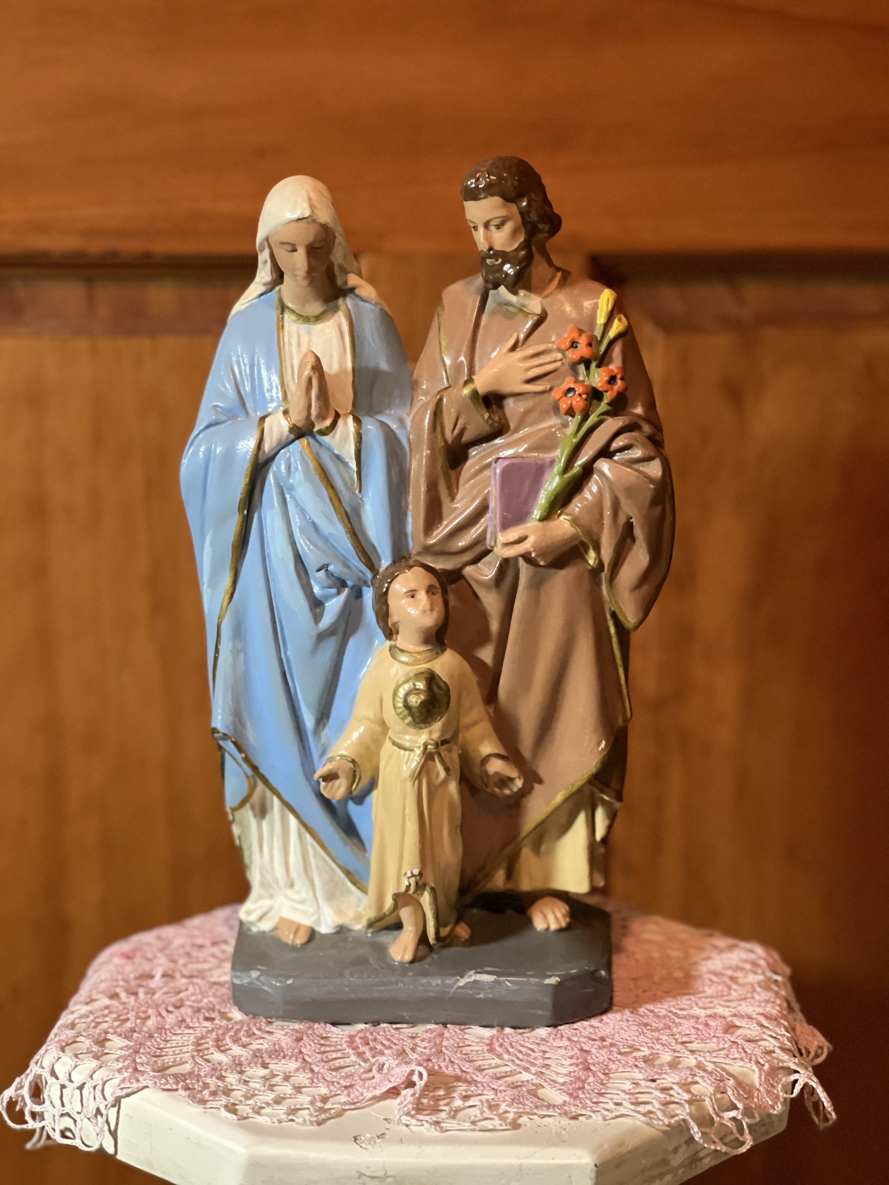 Religious figurine of three saints on a small base