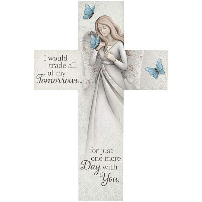 Cross-shaped memorial plaque with a woman and blue butterflies