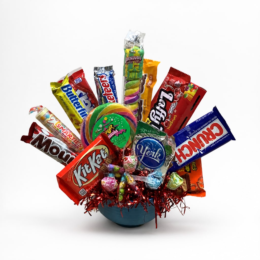 Candy bouquet in a blue bowl with assorted wrapped sweets and lollipops