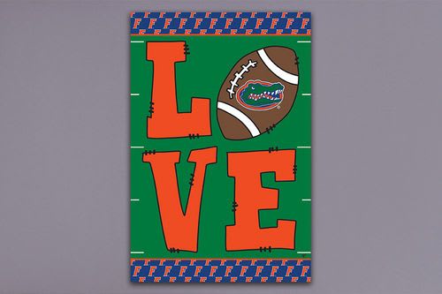 Florida Gators-themed sign with the word LOVE and a football