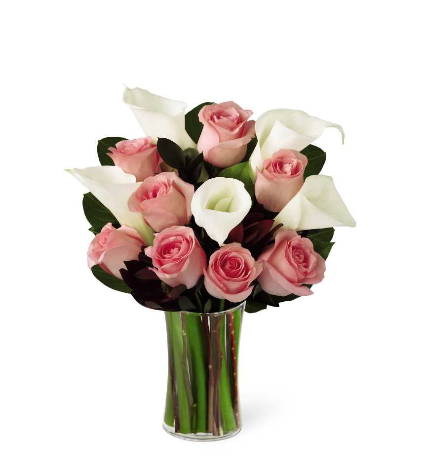The FTD Warm Embrace Bouquet - The FTD Warm Embrace Bouquet is a sweet way to offer your sympathy and bring comfort. Bright white calla lilies are matched with blushing pink roses and an assortment of lush greens, perfectly arranged in a clear glass gathering vase to create an inspiring bouquet of peace and warmth.