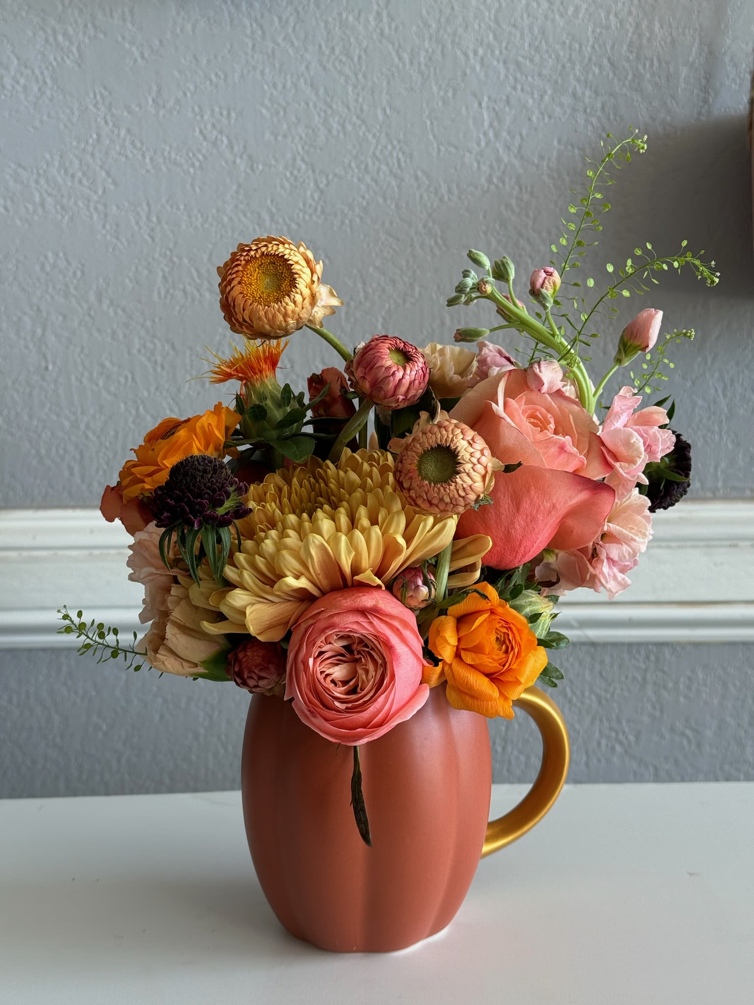 Pumpkin spice latte - This one is for the coffee lovers!! You can't drink these blooms but once their gone you can fill this pumpkin mug with a pumpkin spice latte!