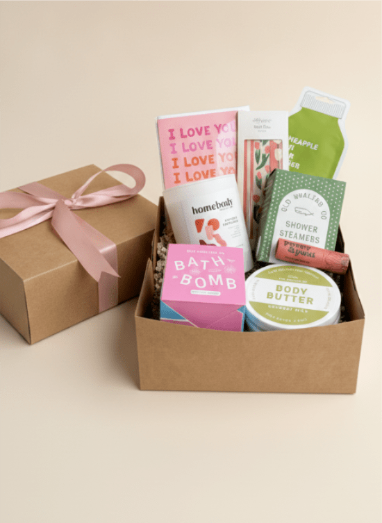 Spa Gift Box - Who doesn't want a spa day? This special gift box starts out with facemask, shower steamer, candle, body butter, bath bomb, greeting card, nail file and lip balm! Upgrade for more items added!  (Substitutions may occur as needed)
