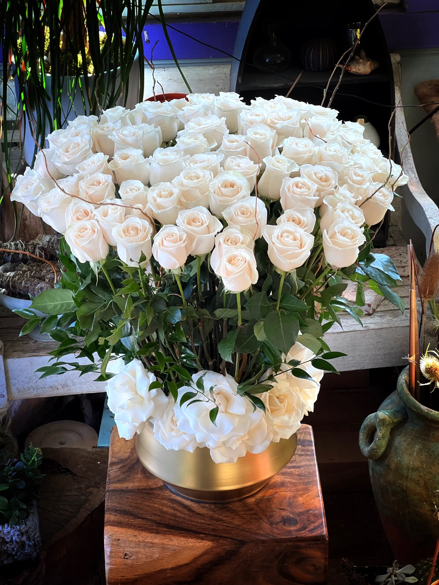 Renaissance Roses - 100 White Premium Ecuadorian Roses in Gold Metal Vase.  (Available in different colored roses as well upon request - may or may not be available in different color)  