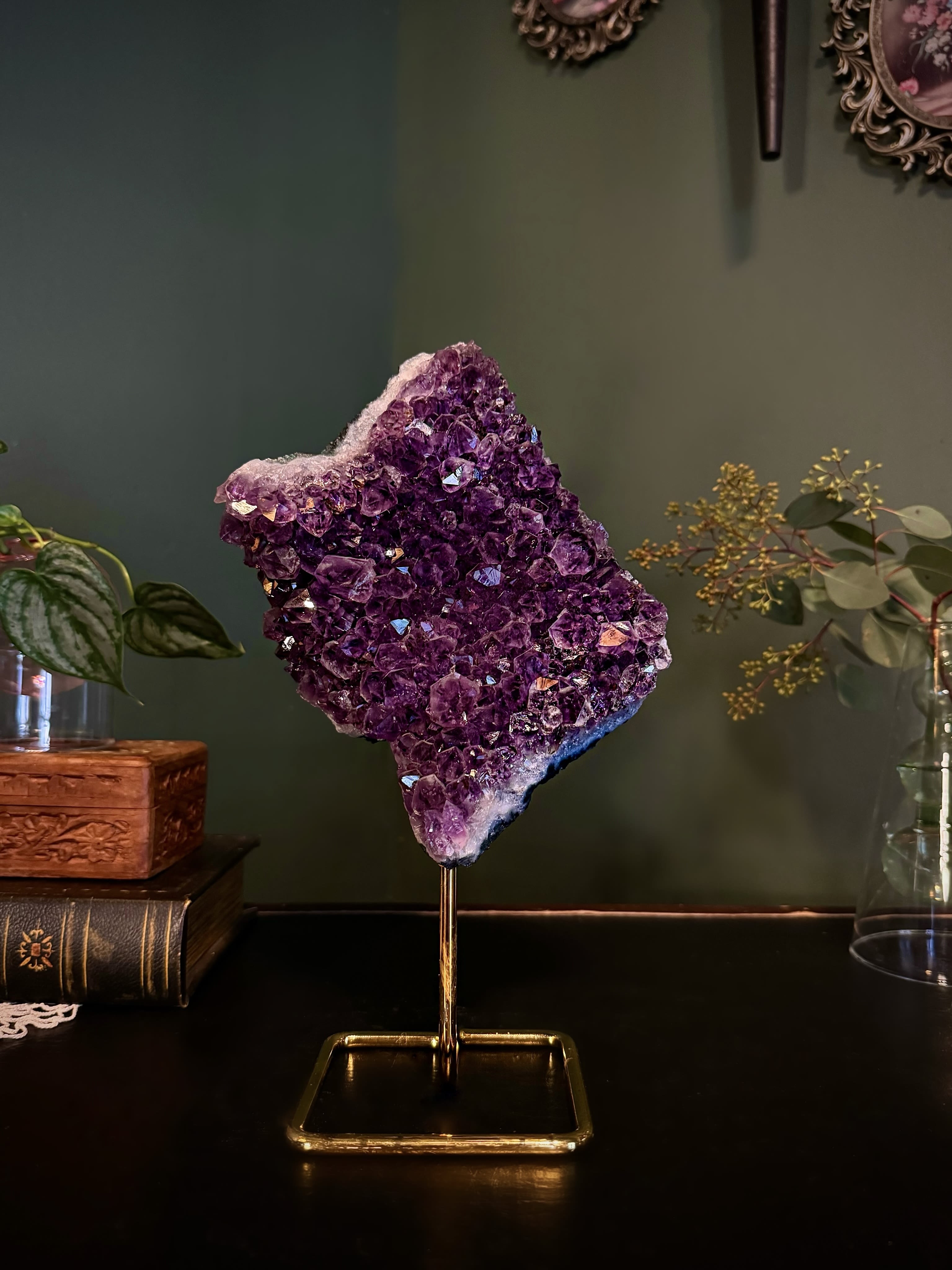Purple crystal cluster on a gold stand