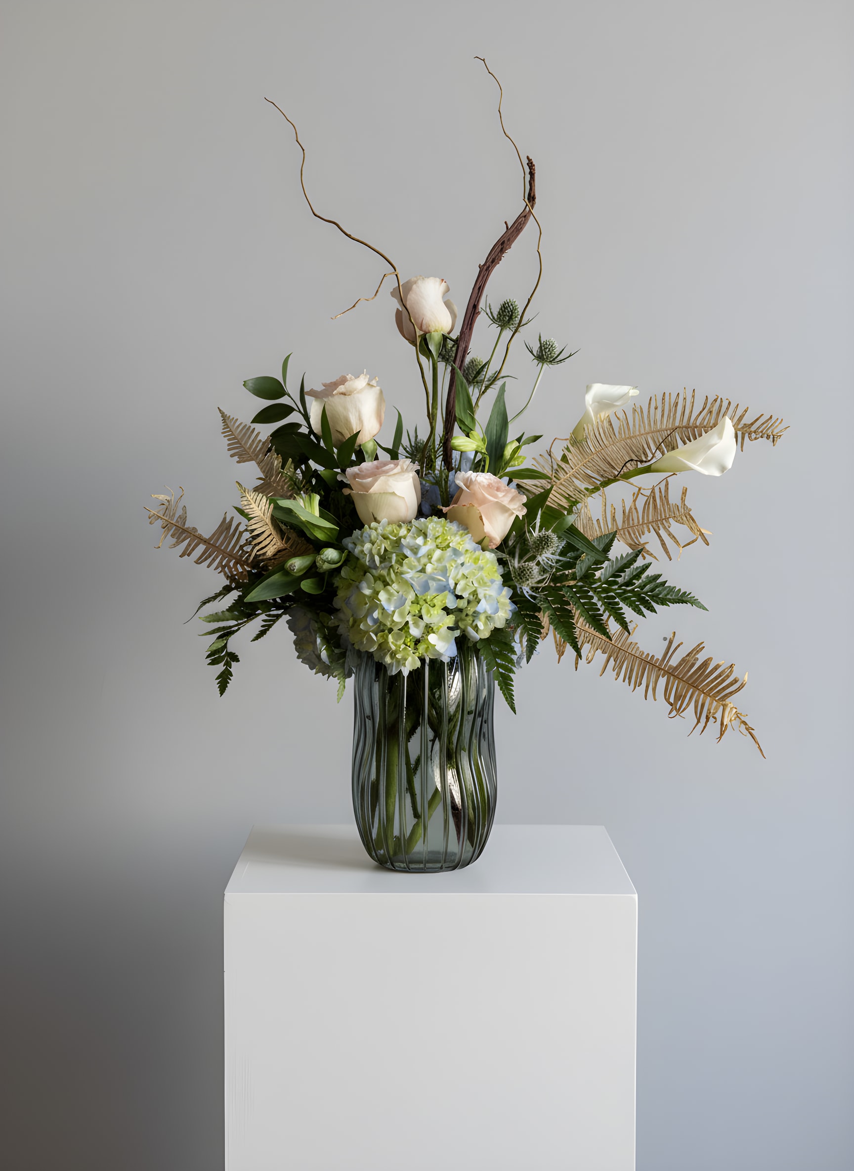 High Definition Love - **VASE WILL BE SIMILAR, NOT THE EXACT ONE SHOWN IN THE PHOTO, IF YOU ORDER THIS ARRANGEMENT THIS WEEK.   Because flowers follow the rhythm of the seasons, their availability often changes often. Your arrangement may vary slightly from the photo, and some filler and accent varieties may differ. We design with the freshest blooms available, making substitutions when needed—while always preserving the overall mood and shape. Always fresh, artful, and beautifully composed.  The arrangement delivered will be inspired by this photo.  For specific flower or color requests, please contact us before ordering.
