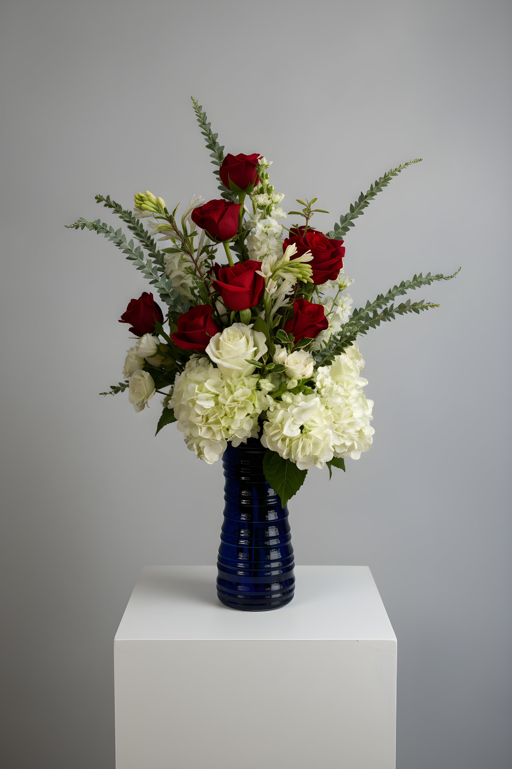 In Honor of You - Because flowers follow the rhythm of the seasons, their availability often changes often. Your arrangement may vary slightly from the photo, and some filler and accent varieties may differ. We design with the freshest blooms available, making substitutions when needed—while always preserving the overall mood and shape. Always fresh, artful, and beautifully composed.  The arrangement delivered will be inspired by this photo.  For specific flower or color requests, please contact us before ordering.