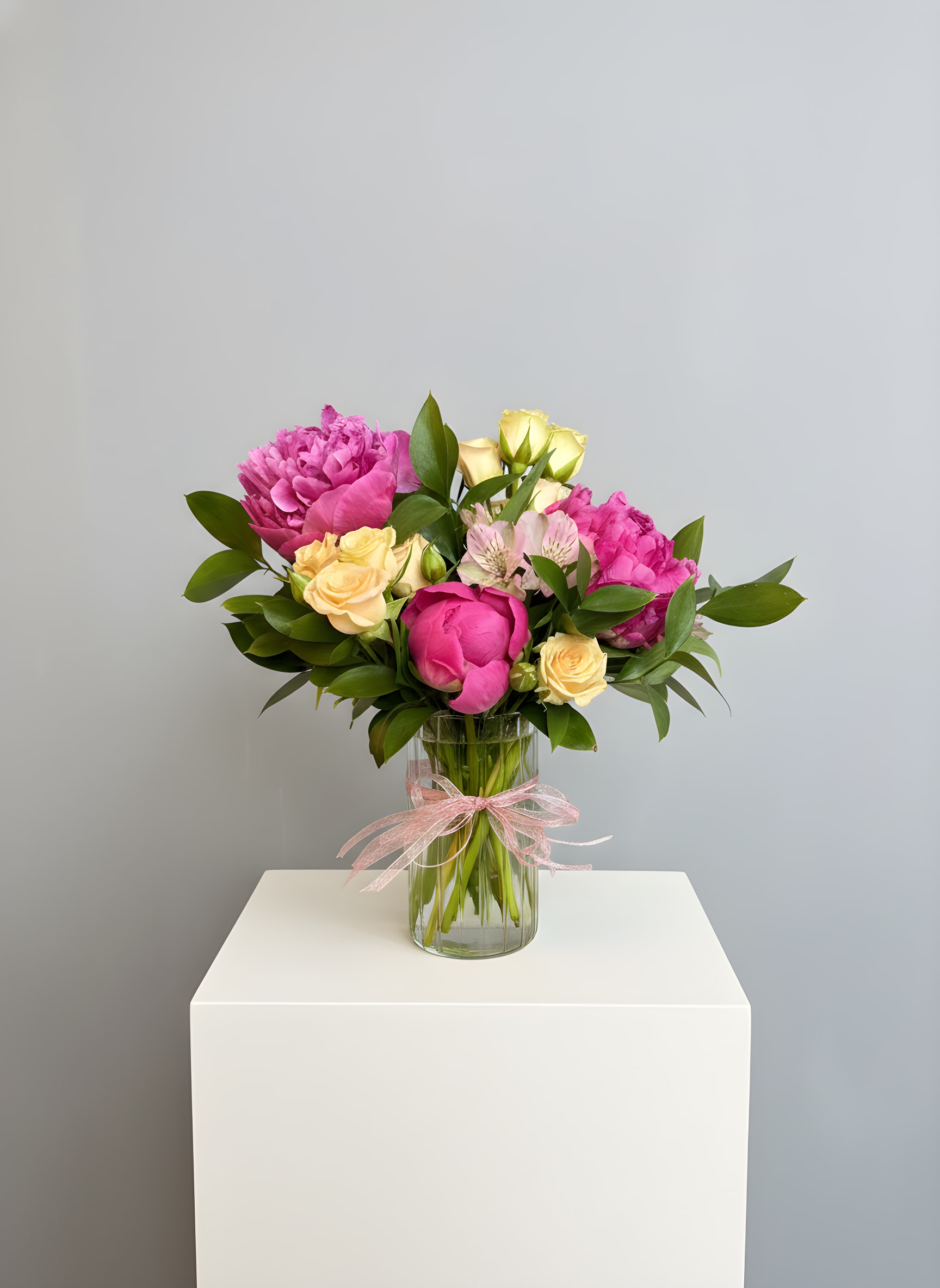 Peony Promise - Because flowers follow the rhythm of the seasons, availability changes often. Your arrangement may vary from the photo, and some varieties may differ. We design with the freshest blooms available, making substitutions when needed—while always preserving the overall mood: fresh, artful, and beautifully composed.  For specific flower or color requests, please contact us before ordering.