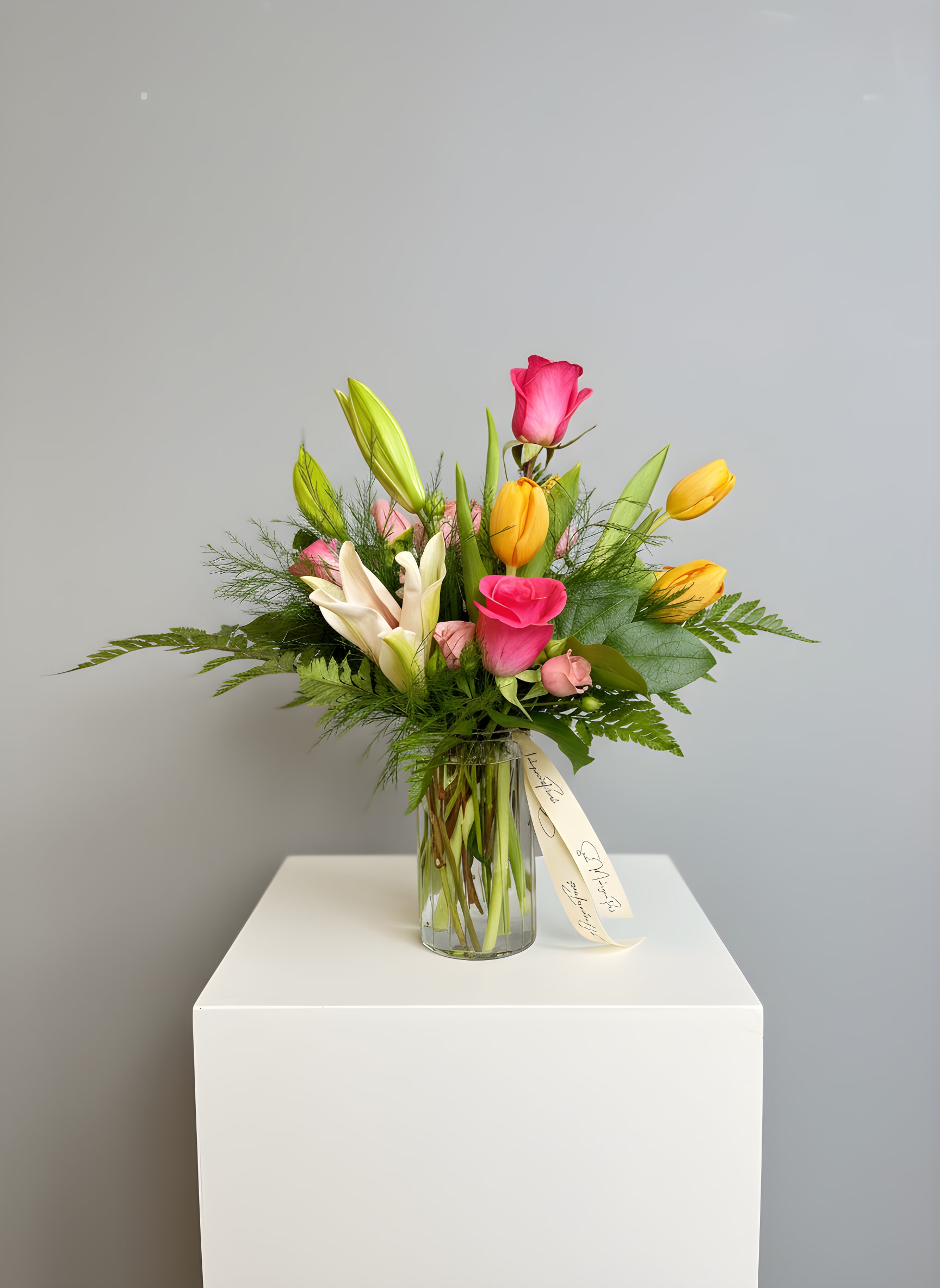 Spring Time Love - Because flowers follow the rhythm of the seasons, availability changes often. Your arrangement may vary from the photo, and some varieties may differ. We design with the freshest blooms available, making substitutions when needed—while always preserving the overall mood: fresh, artful, and beautifully composed.  For specific flower or color requests, please contact us before ordering.