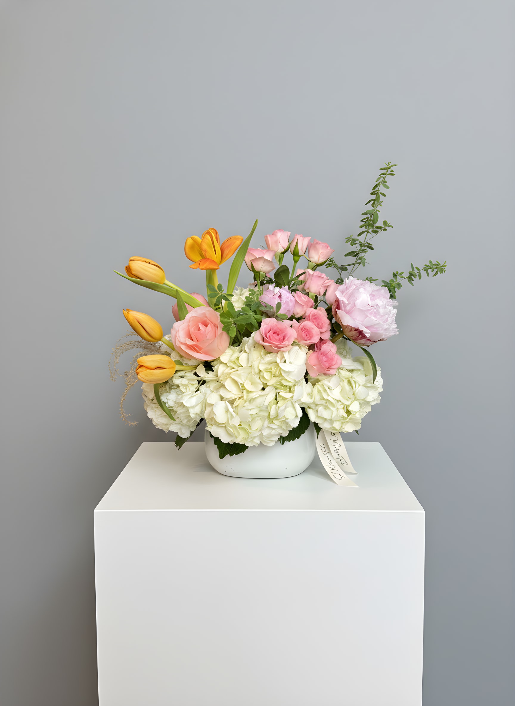 A Celebration of You - Because flowers follow the rhythm of the seasons, availability changes often. Your arrangement may vary from the photo, and some varieties may differ. We design with the freshest blooms available, making substitutions when needed—while always preserving the overall mood: fresh, artful, and beautifully composed.  For specific flower or color requests, please contact us before ordering.