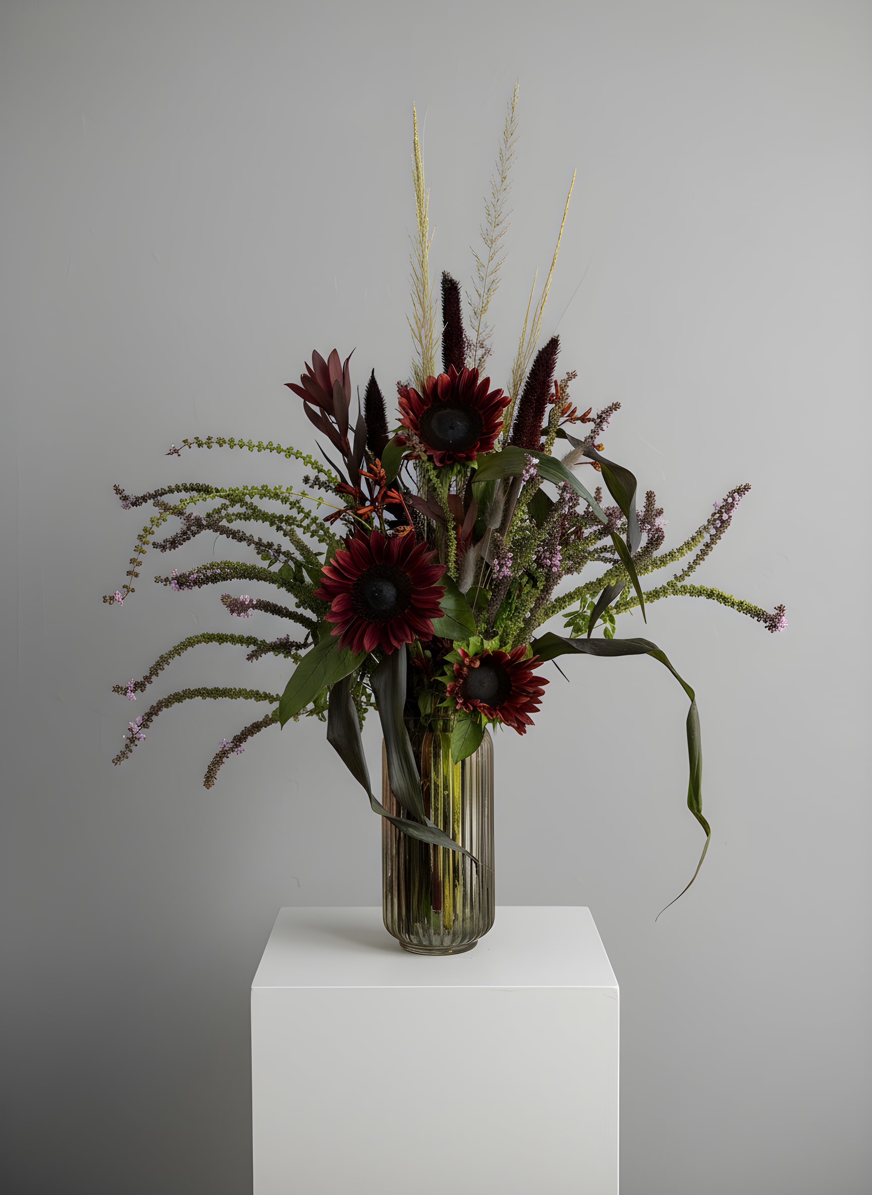 a Vampire's Love - Because flowers follow the rhythm of the seasons, availability changes often. Your arrangement may vary from the photo, and some varieties may differ. We design with the freshest blooms available, making substitutions when needed—while always preserving the overall mood: fresh, artful, and beautifully composed.  For specific flower or color requests, please contact us before ordering.