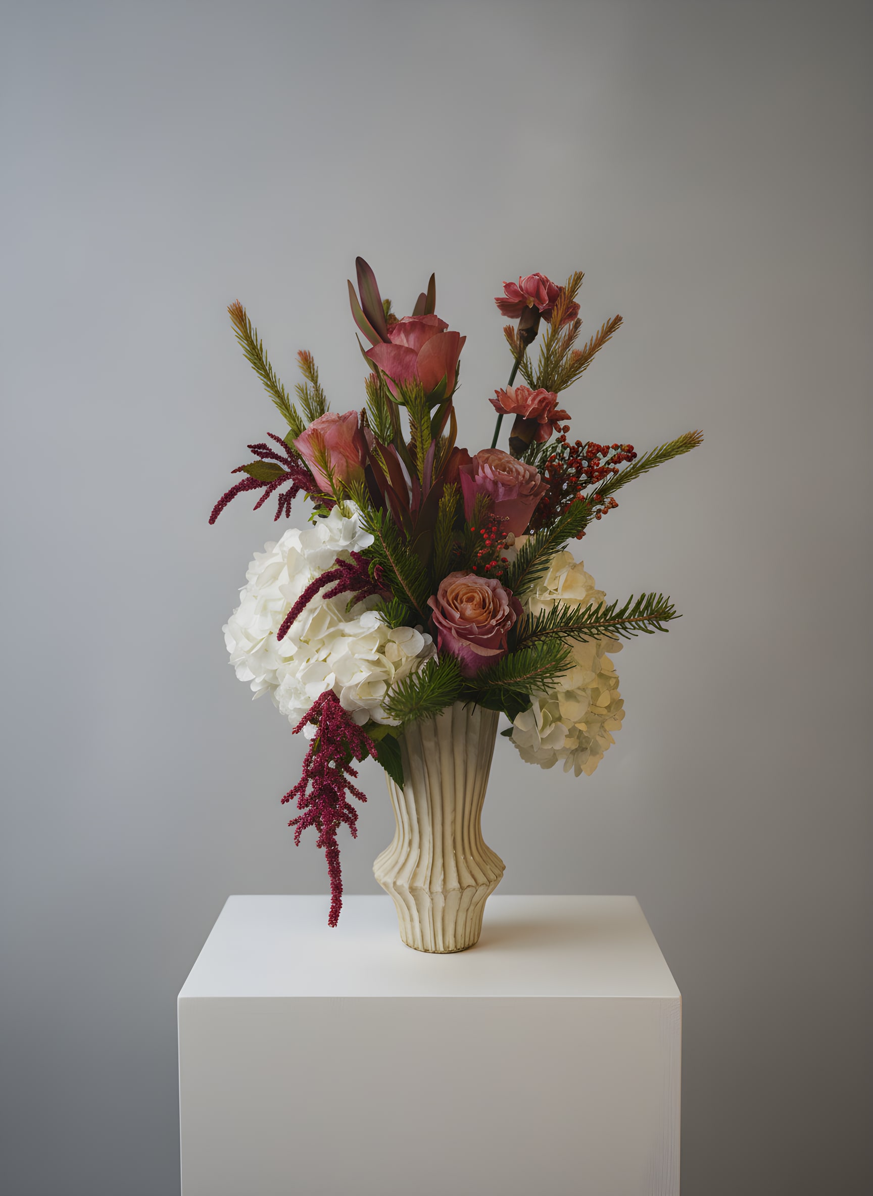Strawberry Kiss - Because flowers follow the rhythm of the seasons, availability changes often. Your arrangement may vary from the photo, and some varieties may differ. We design with the freshest blooms available, making substitutions when needed—while always preserving the overall mood: fresh, artful, and beautifully composed.  For specific flower or color requests, please contact us before ordering.  *Vase in photo is from our Spring 2025 collection and may be substituted with a similar vase once sold out.  
