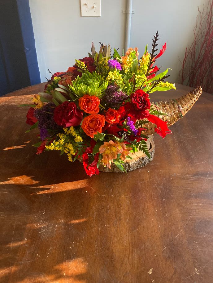 cornucopia a bounty - cornucopia filled with quality fall flowers