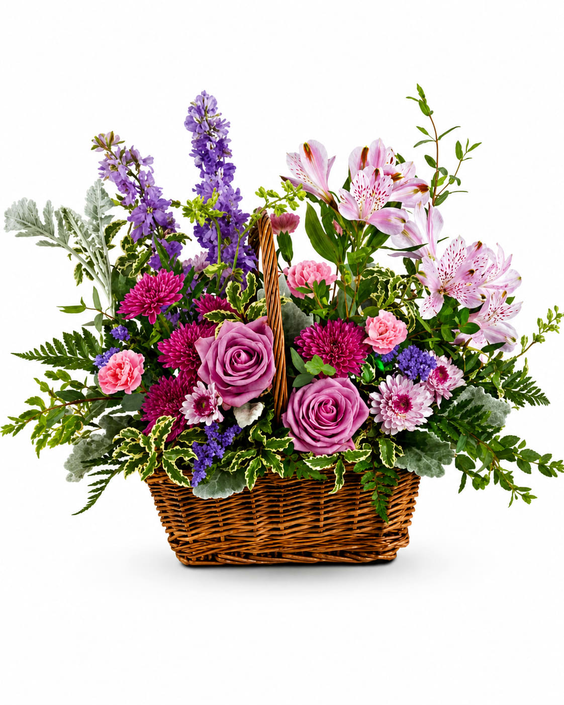 small garden - Lavender roses, pink lilies and white carnations with asters in a rectangular wicker basket - a lush, garden-style mix in purple, pink, white and green for cheerful gifting.