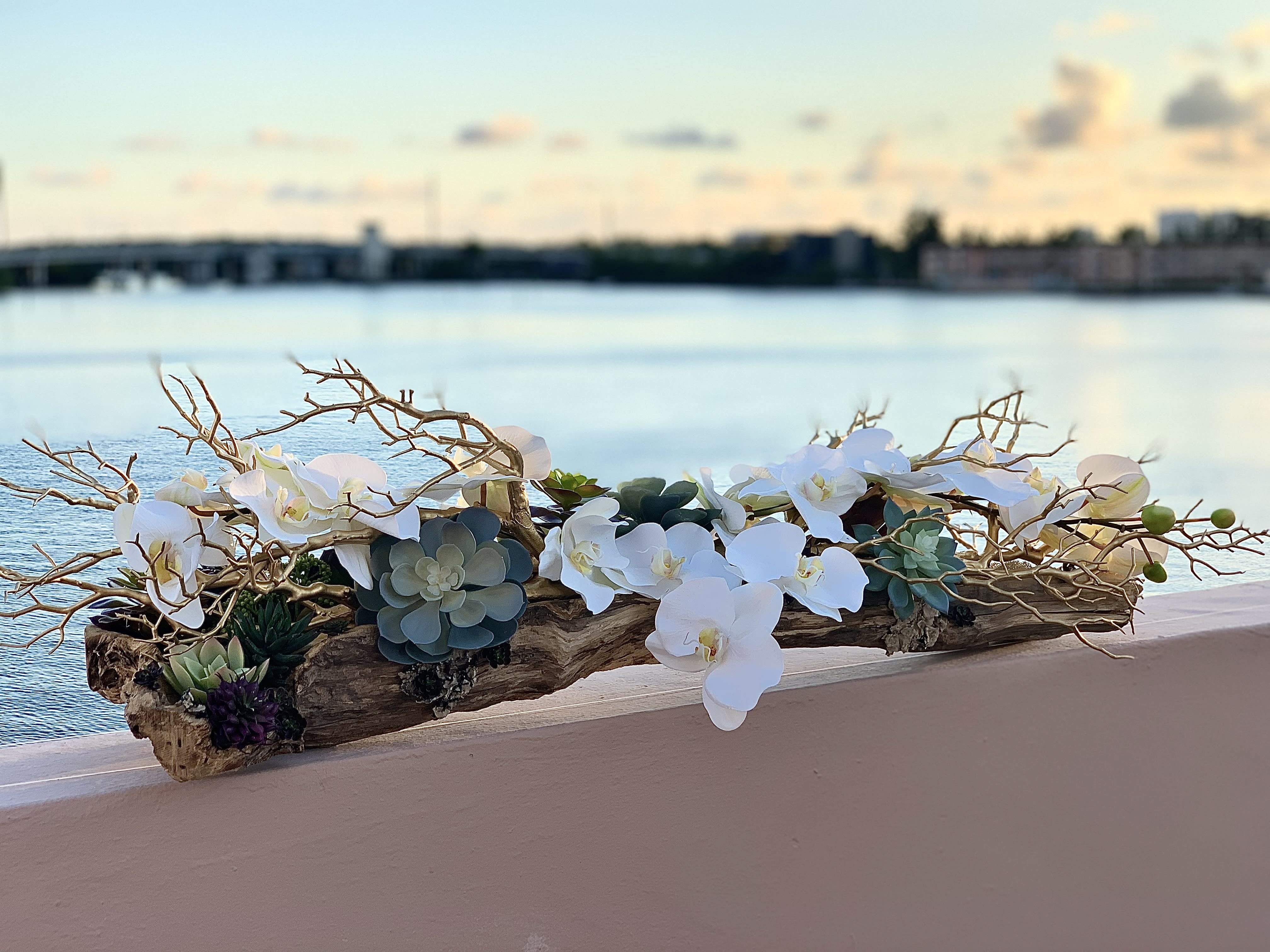 Constellation - Silk orchids with golden driftwoods and succulents. Custom made. Beautiful decor for your home.   Silk flowers are crafted from a protein fibre spun by the silk worm, producing lifelike flowers. Flowers described as being made of silk with a "real touch technique" are not made of silk, but rather are made of polyester, polymers and plastics.  Pre order 2 days.  ▪️ Delivery to their door Each bouquet is unique and is prepared by an expert florist and our customer service team is at your service to ensure the best experience possible.  ▪️Bouquets you can enjoy for longer Some flowers arrive a little closed to ensure extra freshness and protection during shipping. Enjoy the magic of seeing them fully bloom. 