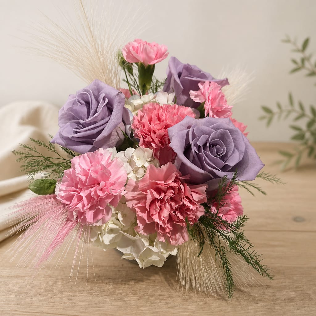 Pink and lavender bouquet with carnations and roses