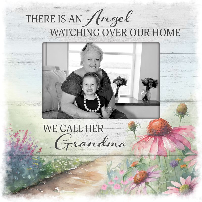 Memorial plaque with a grandmother and child photo and floral artwork