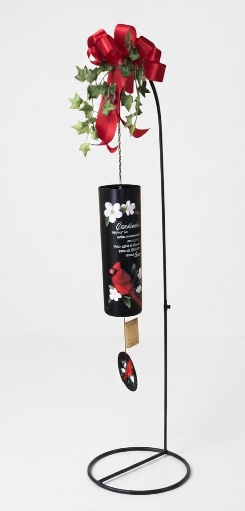 Hanging black candle holder with red bow and ivy decoration