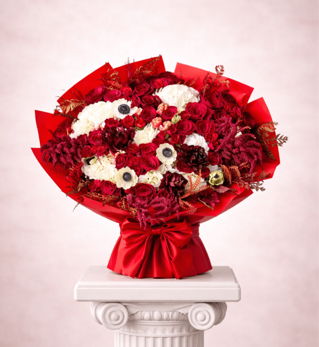 Sunrise  - Brighten any space with our Elegant Flower Bouquet! Bursting with vibrant blooms, this stunning arrangement features seasonal favorites paired with lush greenery for a breathtaking display.  Perfect for any occasion, it makes an ideal gift or a special treat for yourself. Elevate your decor with this captivating bouquet that brings joy and sophistication to your home or office.  Order yours today and let the beauty of flowers inspire you