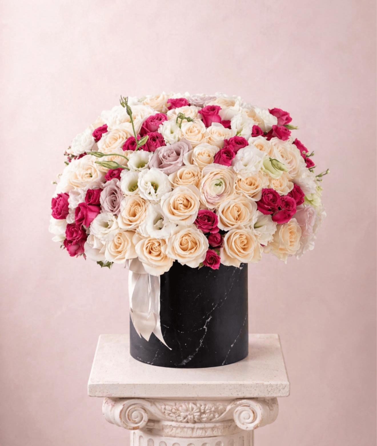Cherry blossom - Brighten any space with our Elegant Flower Box Arrangement! Bursting with vibrant blooms, this stunning display combines seasonal favorites with lush fillers.   Housed in a chic, reusable container, it makes a perfect centerpiece for any occasion be it a gift or a treat for yourself. Elevate your decor with this captivating arrangement that brings joy and sophistication to your home or office. Order yours today and let the beauty of flowers inspire you!