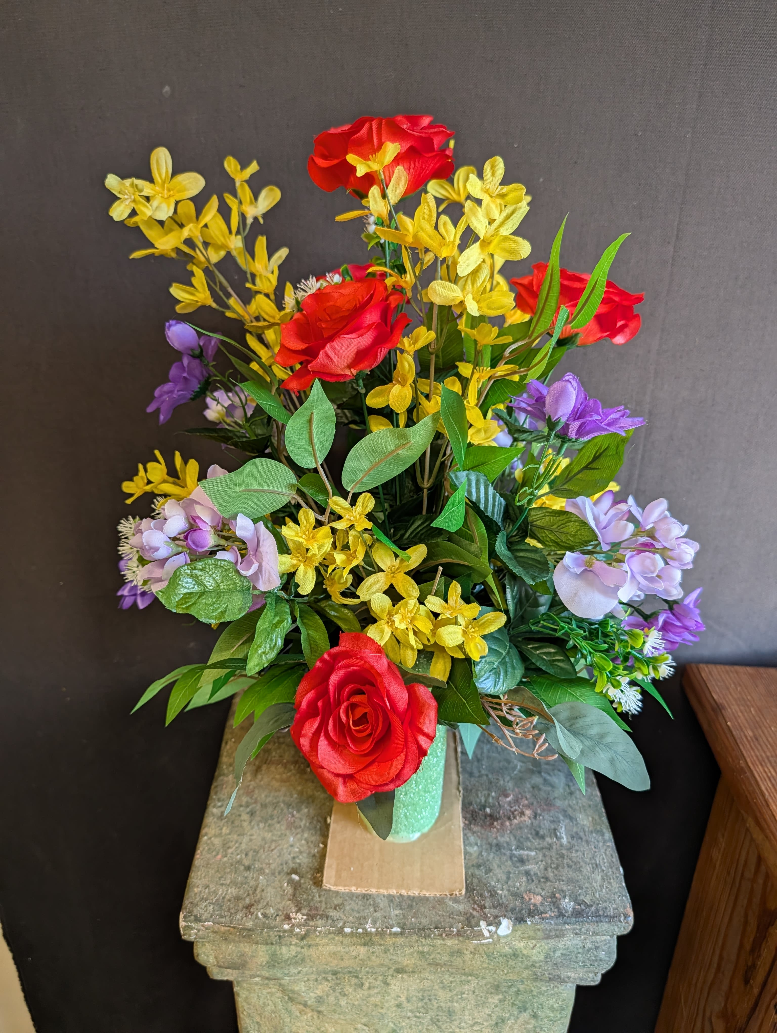 Cemetery Flower Cone - Tennessee Garden - This permanent botanical flower arrangement is made of mixed flowers complimented by greenery and is sure to brighten up the gravesite of your loved one.