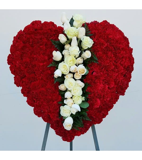 Heart-shaped red floral spray with white roses and calla lilies