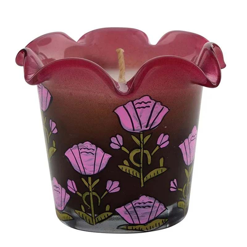 Hand Painted Pomegranate Floral Candle - Brighten your space with our hand-painted ruffle candle, part of our Firebuug Collection. This delightful glass candle is not only a beautiful decor piece but also a fragrant escape for your senses. Each candle is hand-poured with high-quality wax, ensuring a clean and even burn.  Scent Profile: Pomegranate 